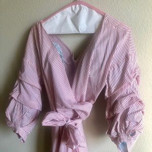 Red & white striped wrap blouse w/ puffy sleeves.